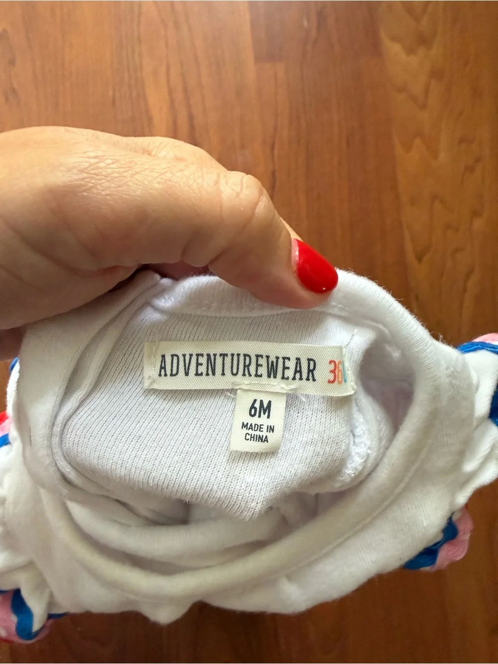 White Baby Romper with Red & Blue Ruffle Sleeves